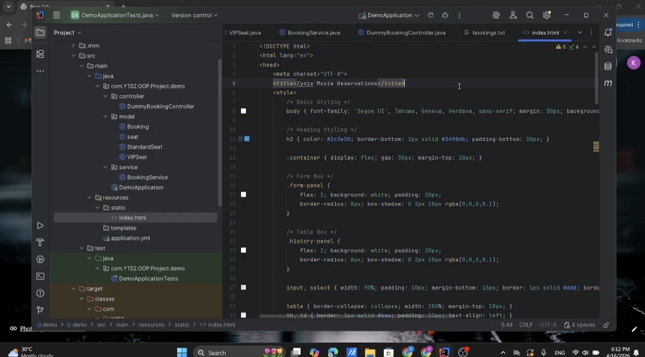 Screenshot of Java IDE with a movie reservation booking system project open